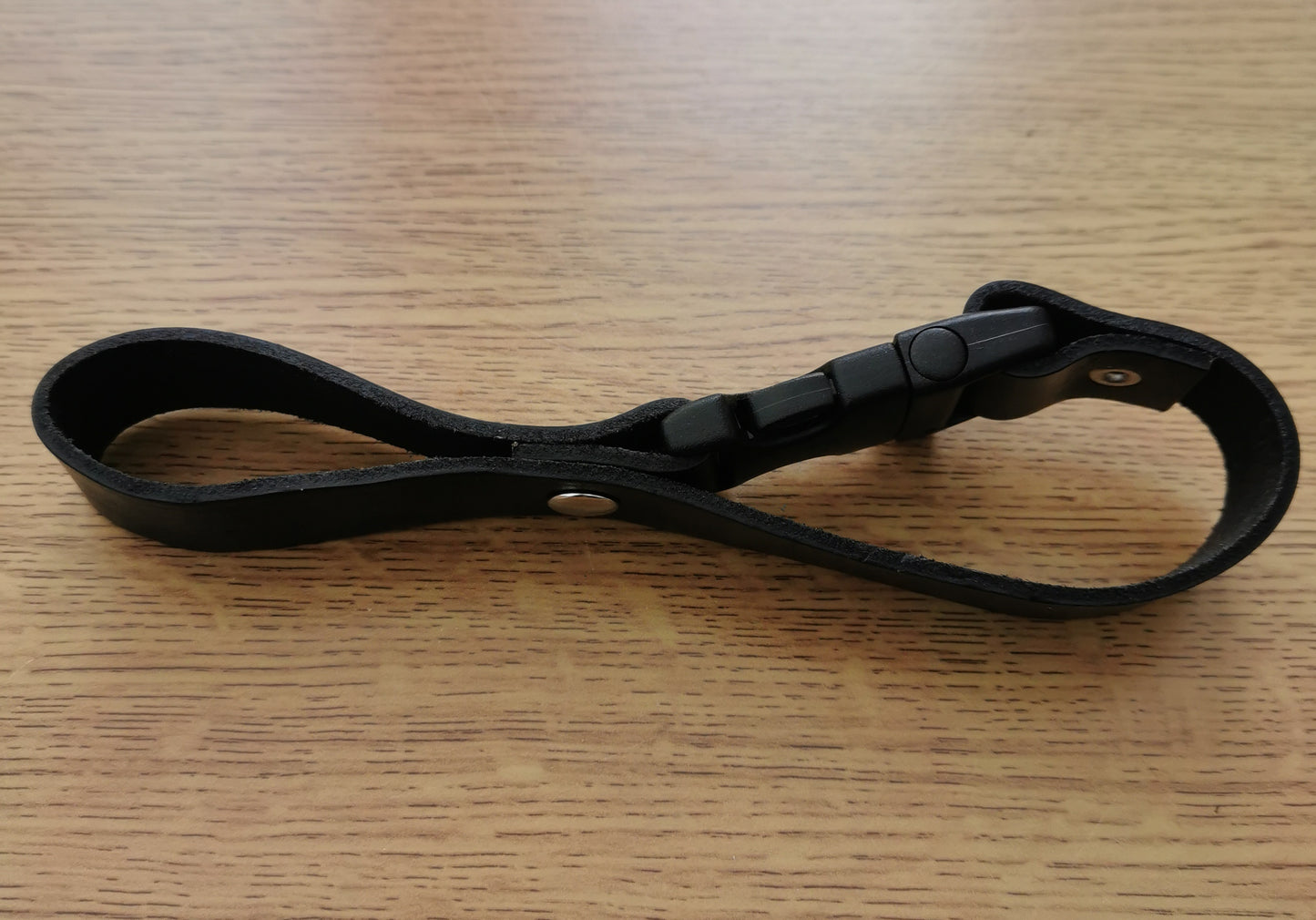 Ghostbusters trap cable / hose holsters in GB1 leather or GB2 webbed styles.