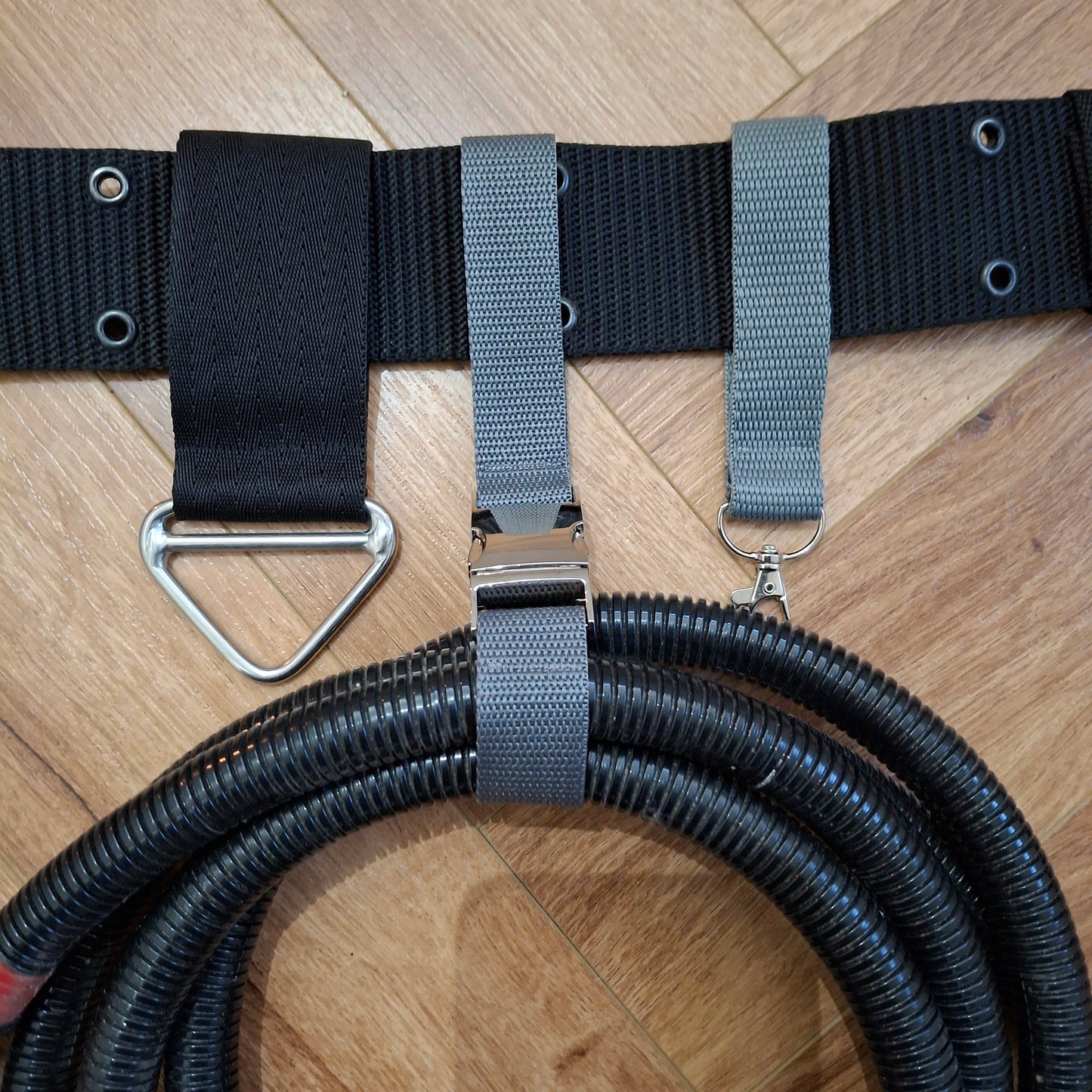 Ghostbusters trap cable / hose holsters in GB1 leather or GB2 webbed styles.